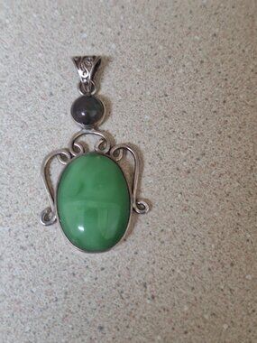 SILVER PENDANT.